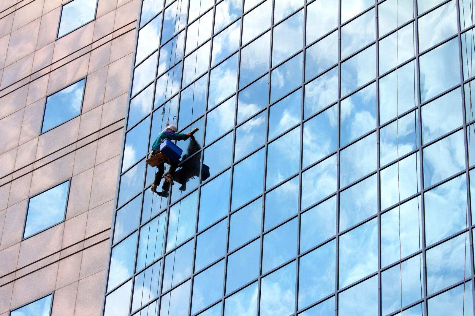 Professional commercial window cleaning on a Madison, WI office building