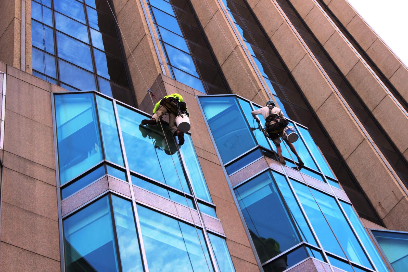 Professional crew performing high-rise window cleaning in Central Wisconsin