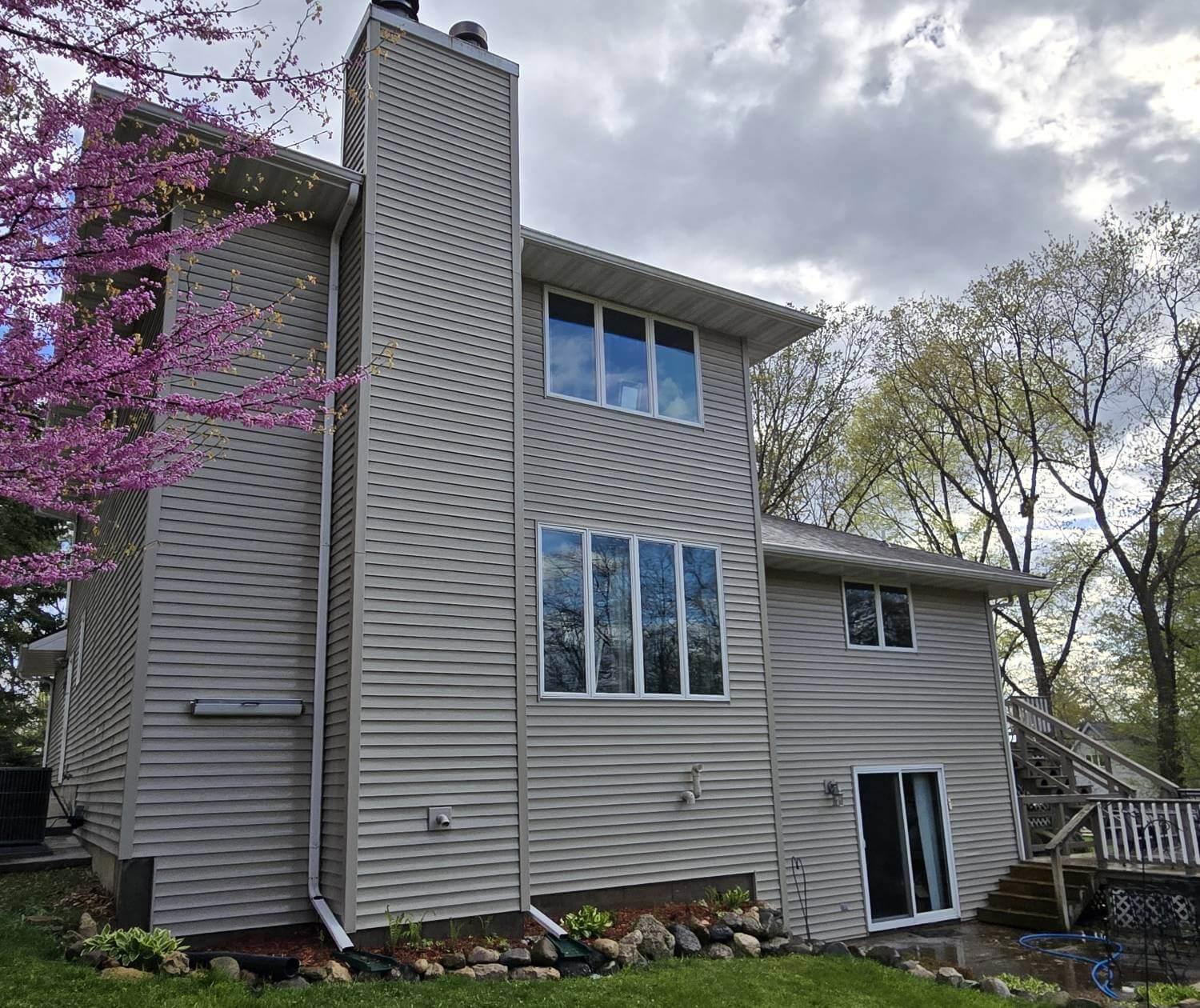 Home in Adams Wisconsin after soft washing the siding and cleaning the windows.