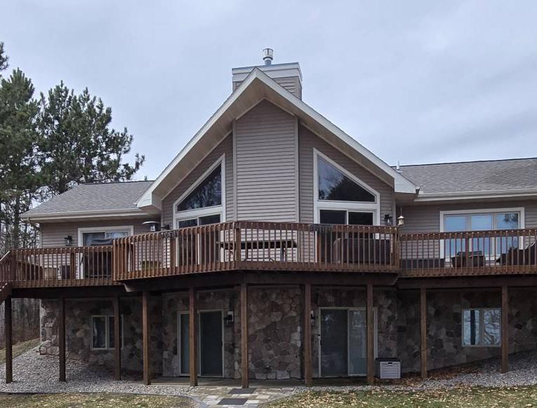 Clean home in Wisconsin Dells after window cleaning and soft washing the siding and the roof.