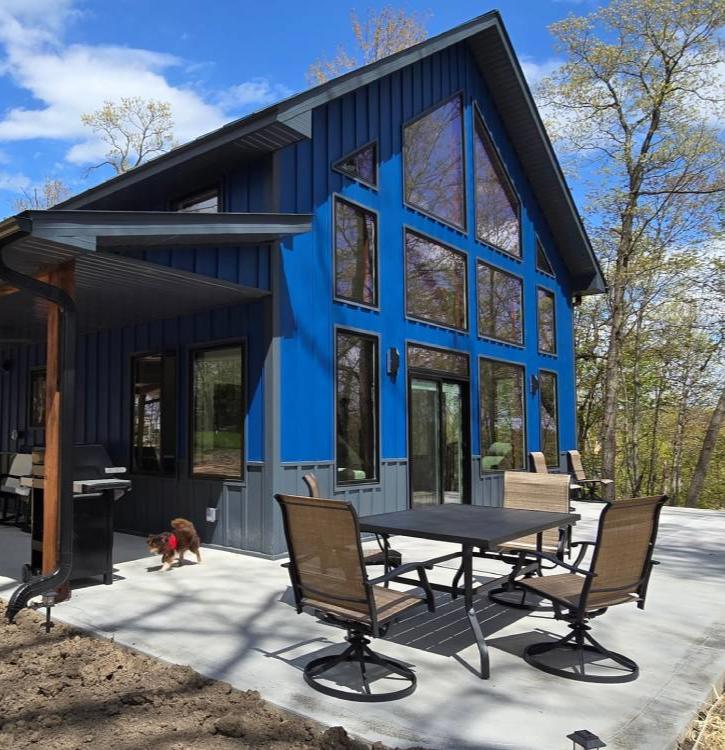 A beautiful blue home in Wisconsin Dells received our signature exterior window wash
