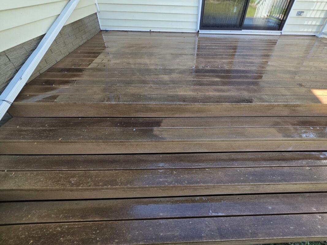 Deck stairs at a home in La Crosse before cleaning
